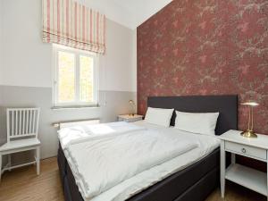 Ein Bett oder Betten in einem Zimmer der Unterkunft Villa Amelia, App. 07