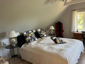 Postel nebo postele na pokoji v ubytování Fuglsang Bed & Breakfast