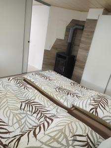 a large bed in a room with at Ferienwohnung Martin in Neuhausen ob Eck