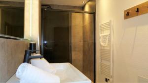 Koupelna v ubytování Appartements Plus