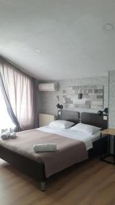 Кровать или кровати в номере Lea Guest House