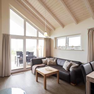 Χώρος καθιστικού στο Luxuswellnesshaus Buhne