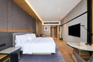 TV a/nebo společenská místnost v ubytování The Westin Zhongshan Guzhen