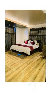 מיטה או מיטות בחדר ב-Hotel Saima
