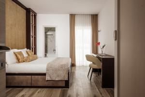 1926 Le Soleil Hotel & Spa客房内的一张或多张床位
