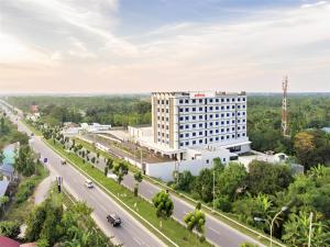 an aerial view of a building with a road at d'primahotel Kualanamu Medan Formerly Prime Plaza Hotel in Medan