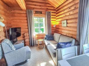 Et opholdsområde på Holiday Home Vuosselinkulma 1 by Interhome + 16 billeder