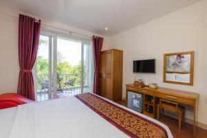 TV a/nebo společenská místnost v ubytování T&T Resort and Spa Phu Quoc