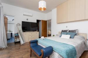 Postel nebo postele na pokoji v ubytování Villa Beach Heaven