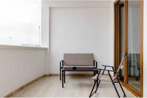 Posezení v ubytování Manfredi Sea Room