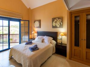 Ένα ή περισσότερα κρεβάτια σε δωμάτιο στο Apartment Mirador Galera Playa by Interhome
