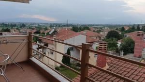 a balcony with a view of a city at Anestis Studios in Lidia