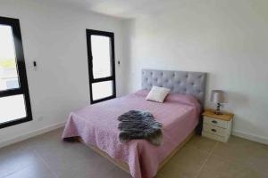 Posteľ alebo postele v izbe v ubytovaní Villa ambrussum Villetelle