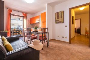 a living room with a couch and a table at KaRol Casa Vacanze in Alghero