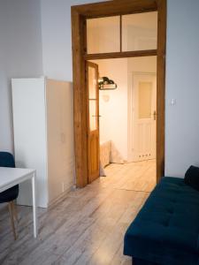 Łóżko lub łóżka w pokoju w obiekcie Old Town Studio