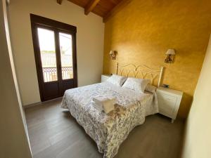 Ένα ή περισσότερα κρεβάτια σε δωμάτιο στο Casa Amada con piscina +26 φωτογραφίες