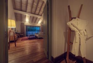 A bed or beds in a room at Fort Bazaar