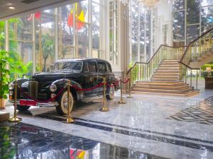 an old car is on display in a building at Karachi Marriott Hotel in Karachi