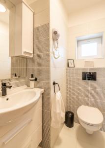 Kúpeľňa v ubytovaní Jégmadár & Fekete Gólya Apartmanok