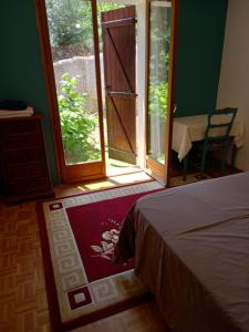 Posteľ alebo postele v izbe v ubytovaní Villa à Marseille dans un cadre bucolique