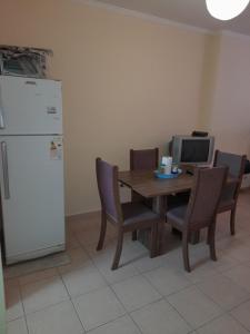Una cocina o kitchenette en Departamentos Niñas 14 fotos más