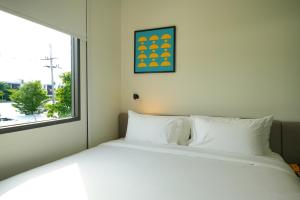 Katil atau katil-katil dalam bilik di GO! Hotel Chonburi at Central Chonburi