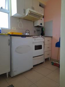 Una cocina o kitchenette en Departamentos Niñas