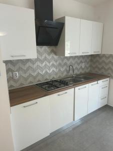 Kuchyň nebo kuchyňský kout v ubytování Apartments Anka Pag