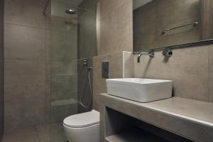 Um banheiro em Mouzaki's Stone Villas