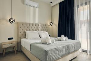 Cama ou camas em um quarto em Mouzaki's Stone Villas