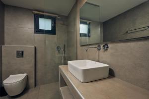 Um banheiro em Mouzaki's Stone Villas