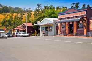a street scene of a town with a building at The Bears Went Over The Mountain in Geeveston
