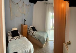 Postel nebo postele na pokoji v ubytování Apartamento Vacacional en Platja D'Aro