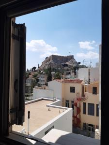 a view from a window of a city at Plaka Sweet House 2 in Athens