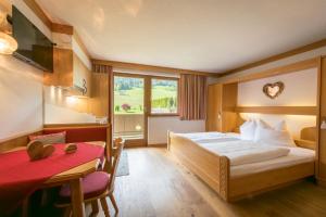 Tempat tidur dalam kamar di Eden Appartements