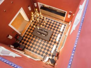 an overhead view of a living room with a couch at Isla Canela Golf Hotel Boutique in Isla Canela