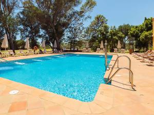 Bazén v ubytování Isla Canela Golf Hotel Boutique nebo v jeho okolí