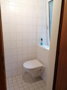 Vonios kambarys apgyvendinimo įstaigoje Wohnung / Ferienwohnung