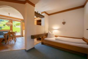 Tempat tidur dalam kamar di Eden Appartements
