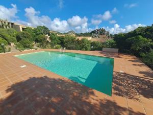 an image of a swimming pool in a yard at Villa cesar in Costa Paradiso
