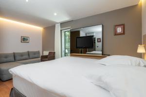 TV a/nebo společenská místnost v ubytování Hotel Nostromo