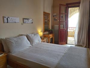 Ένα ή περισσότερα κρεβάτια σε δωμάτιο στο Almyra apt in Mani