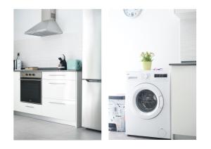 a kitchen with a washer and a washing machine at Karma Famara 2 25m del mar in Famara