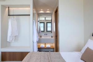 Ένα ή περισσότερα κρεβάτια σε δωμάτιο στο Elessa Hotel