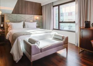 Cama ou camas em um quarto em Qoya São Paulo Paulista, Curio Collection by Hilton