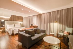 Cama ou camas em um quarto em Qoya São Paulo Paulista, Curio Collection by Hilton