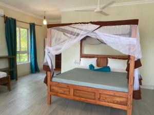 Un ou plusieurs lits superposés dans un hébergement de l'établissement Summer Beach Paje
