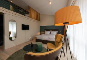 Postelja oz. postelje v sobi nastanitve Hotel Schweizerhof Lenzerheide