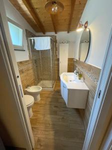 a bathroom with a sink and a toilet and a shower at My Bnb Pisa in Pisa +37 photos
