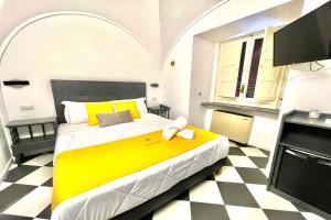 Posteľ alebo postele v izbe v ubytovaní Hotel Stabia